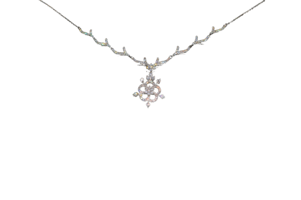 Sterling silver women’s necklace set with floral cubic zirconia pendant and matching earrings on a vine-inspired chain.