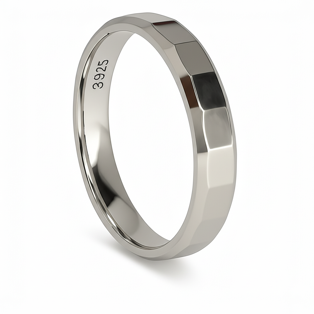 A close-up, angled shot of a polished sterling silver unisex ring with a faceted, geometric design, shown on a white background. The "S925" stamp is visible on the inside of the band.